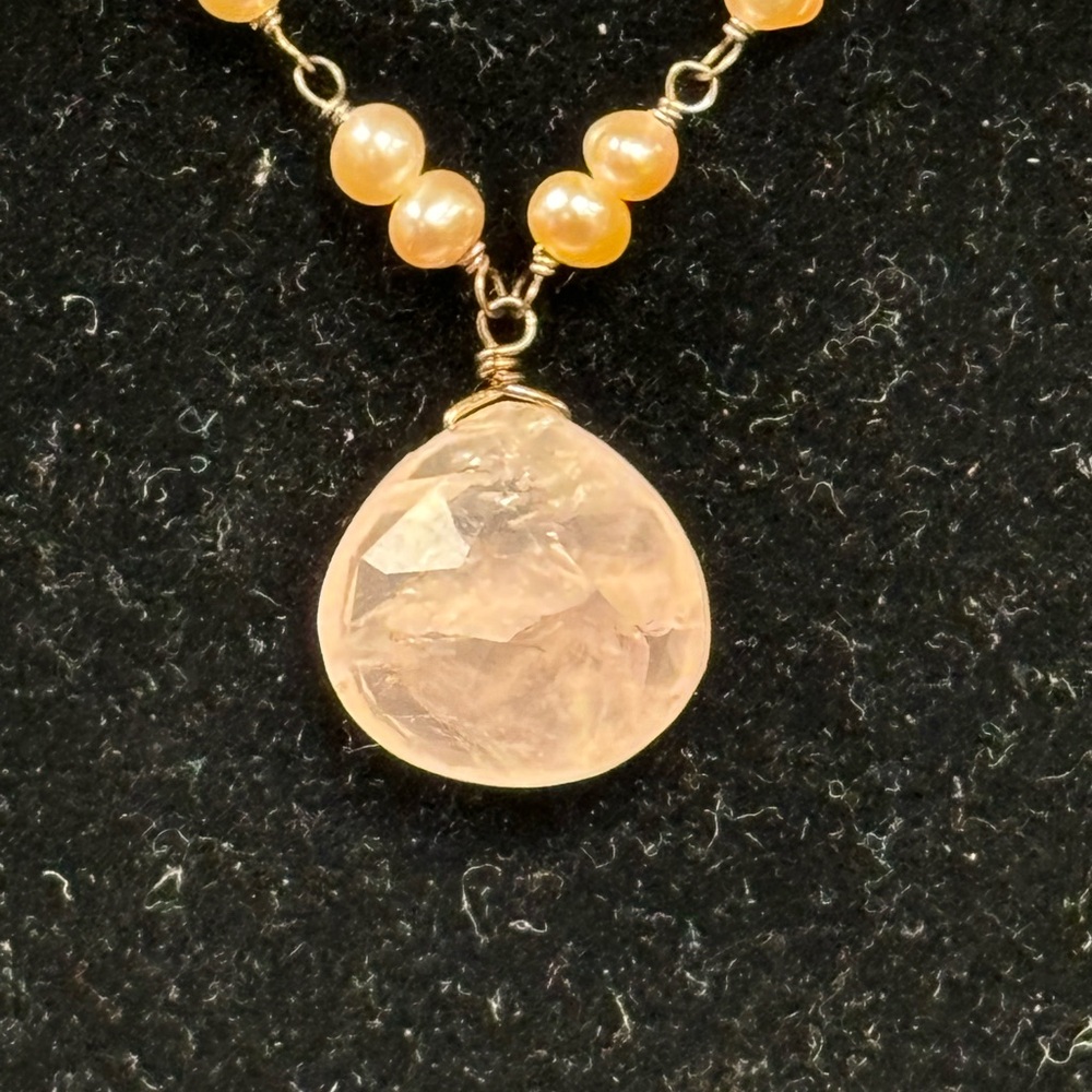Rose quartz pendant on gold plated sterling necklace with pearls.